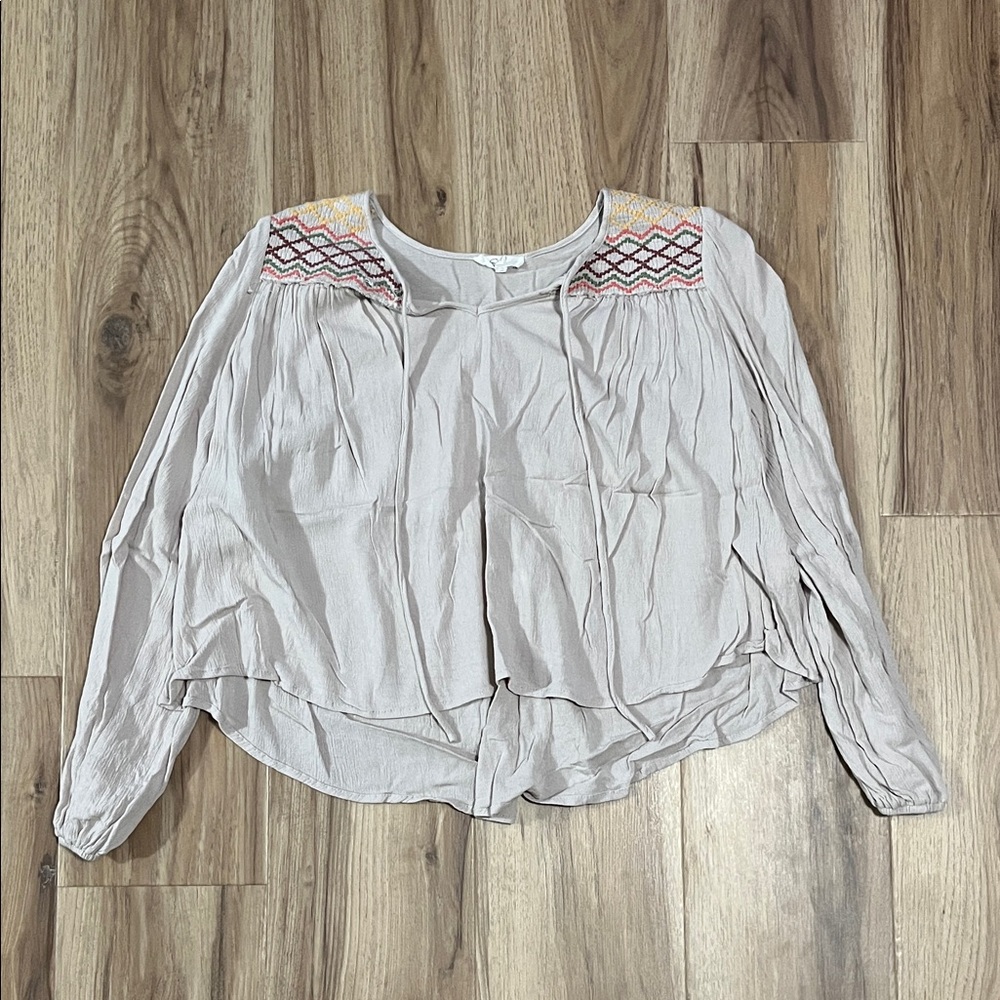 Elegant Beige Blouse with Embroidered Details